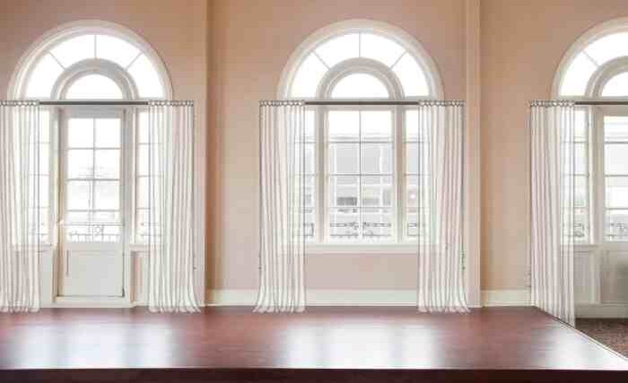 How to decorate large arched windows